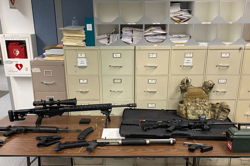 Los Angeles police seized a cache of guns and ammunition from an 18th-floor apartment in Hollywood and arrested the occupant on suspicion of making criminal threats on Tuesday, January 31, 2023.