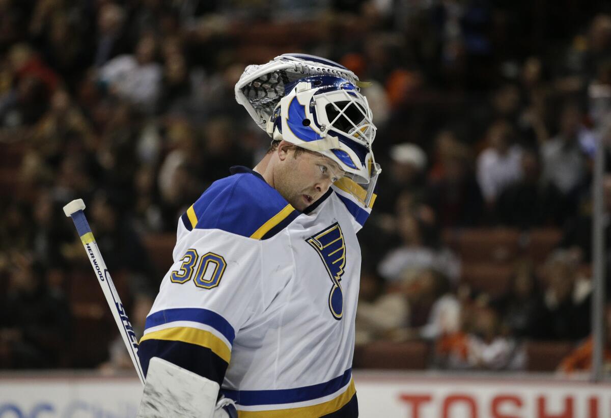 St. Louis goaltender Martin Brodeur puts on his mask during the second period of a game against the Ducks on Jan. 2.