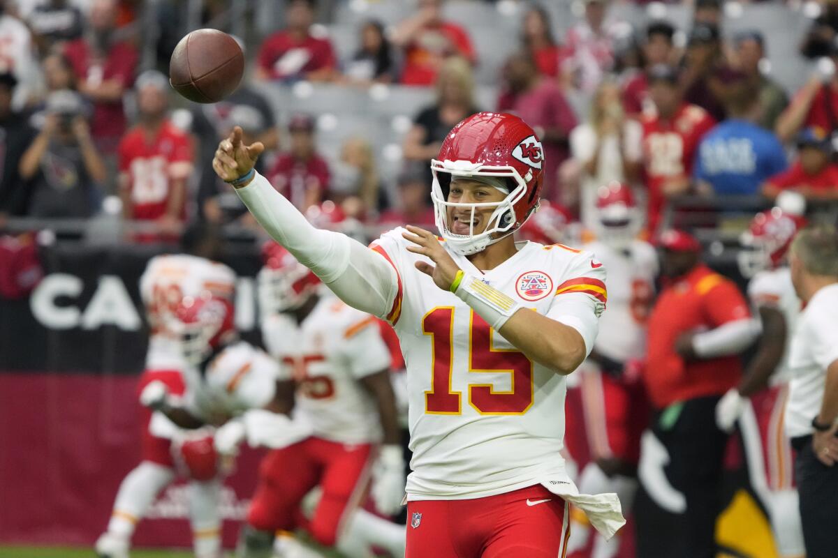 Kansas City Chiefs quarterback Patrick Mahomes warms up before a game.