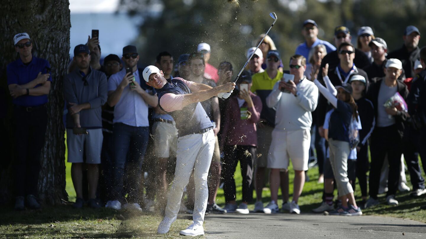 Rory McIlory hits from the rough on the 1st hole during the fourth round of the Farmers Insurance Open at the Torrey Pines Golf Course on Jan. 27, 2019. (Photo by K.C. Alfred/San Diego Union-Tribune)