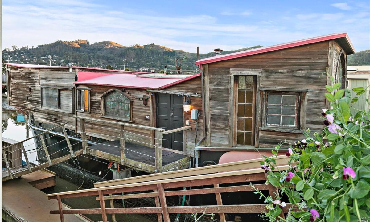 The decommissioned military vessel boasts two bedrooms, a bathroom and bohemian living spaces in 1,200 square feet.
