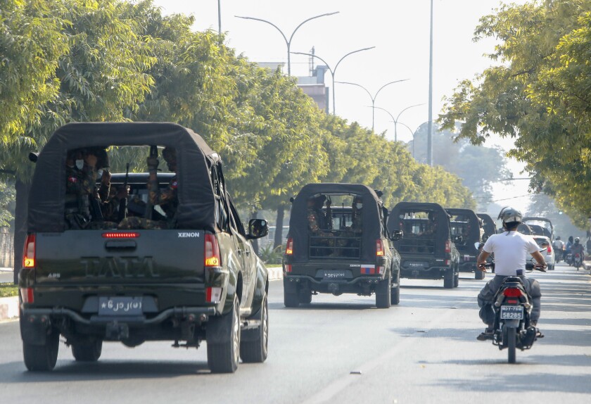 A convoy of army vehicles patrol the streets in Mandalay, Myanmar, Wednesday, Feb. 3, 2021. In the early hours of Monday, Feb. 1, 2021, the Myanmar army took over the civilian government of Aung San Suu Kyi in a coup over allegations of fraud in November's elections. (AP Photo)