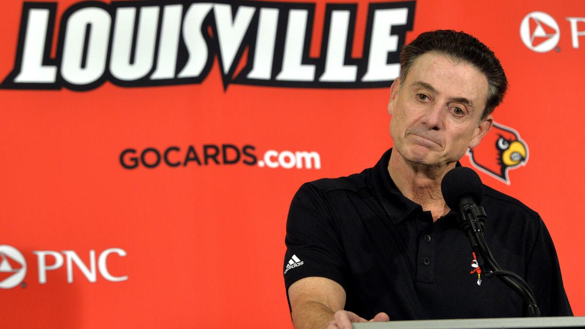 Louisville Coach Rick Pitino was involved in the university's process to add to the self-imposed sanctions on its men's basketball program.