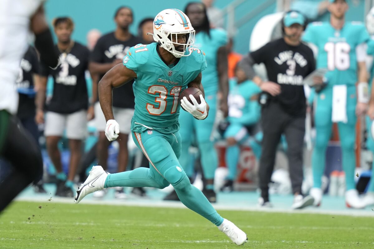 AP source Dolphins bringing back RB duo of Mostert, Wilson The San