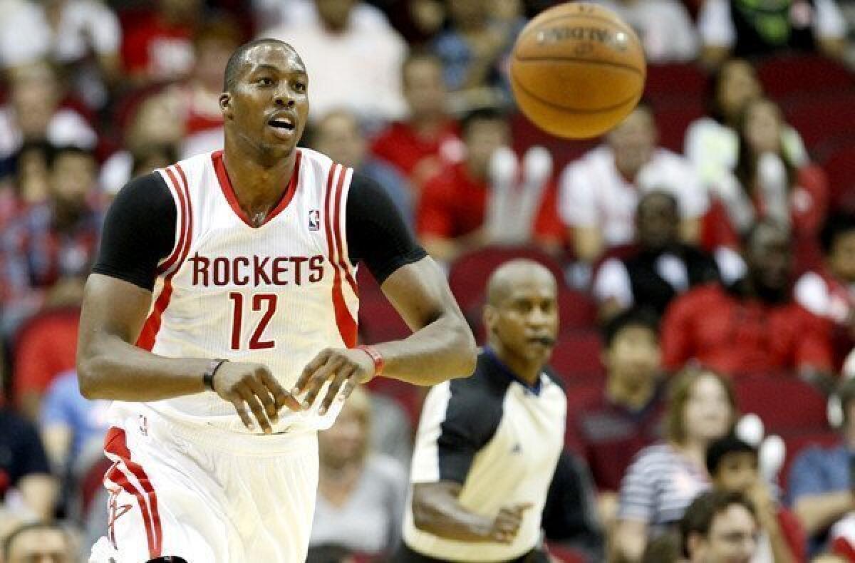 The Rockets acquired free-agent center Dwight Howard in one of the biggest off-season moves, as voted in an anonymous survey of all 30 NBA general managers.