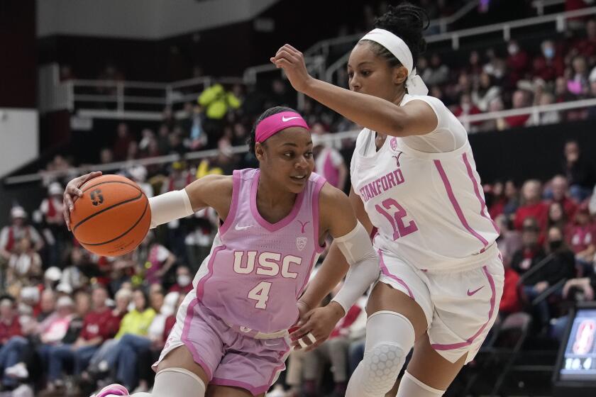 Southern California guard Kayla Williams, left, tries to drive to the basket while defended by Stanford guard Indya Nivar.
