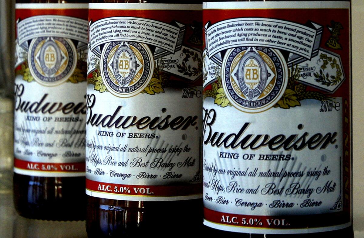 Anheuser-Busch unveiled the ingredients of Budweiser and Bud Light for the first time Thursday, a day after a popular food blogger started an online petition to get major brewers to list what's in their beverages.
