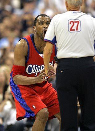 Cuttino Mobley argues with the ref after being called for a foul against the Denver Nuggets.