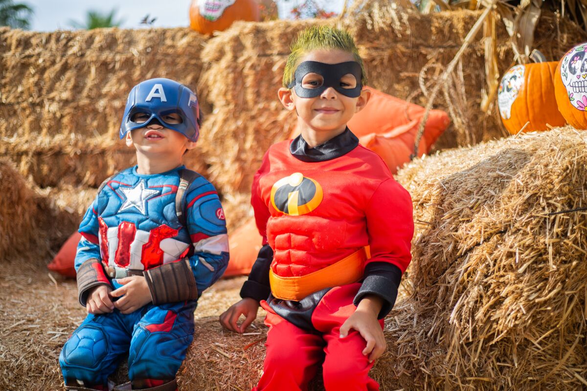 Superhero rick or treaters at a past Village at Pacific Highlands Ranch Halloween.