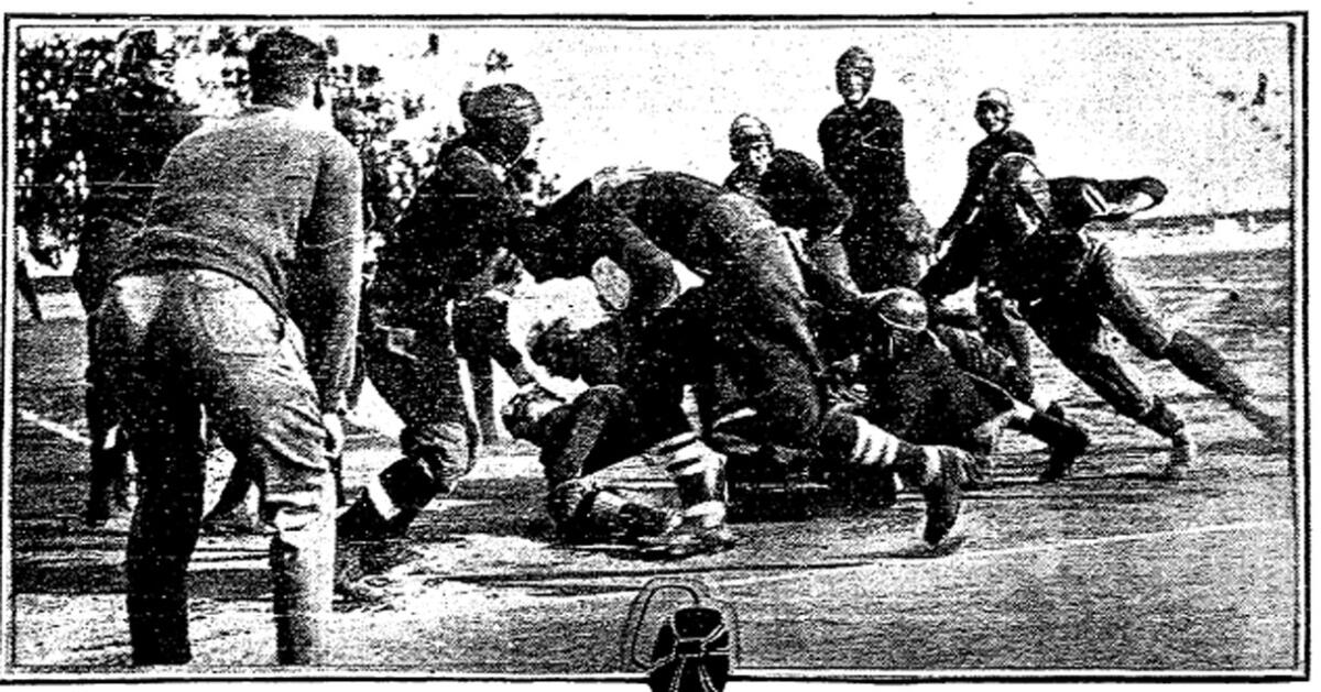 San Diego Junior College and Chaffey Junior College players mix it up during the local team's 14-0 win on Nov. 11, 1921.