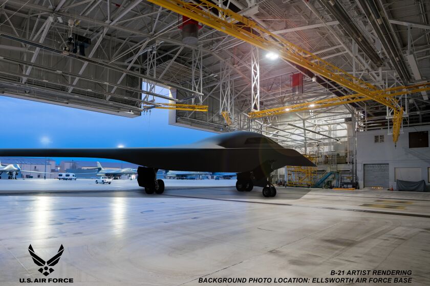 A rendering of the B-21 bomber in a hangar at Ellsworth Air Force Base in South Dakota