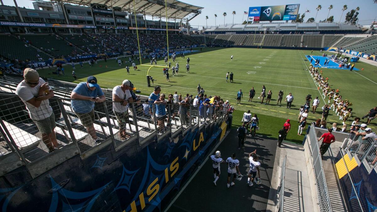 The Chargers take the field for a joint practice with the Rams at StubHub Center last week.