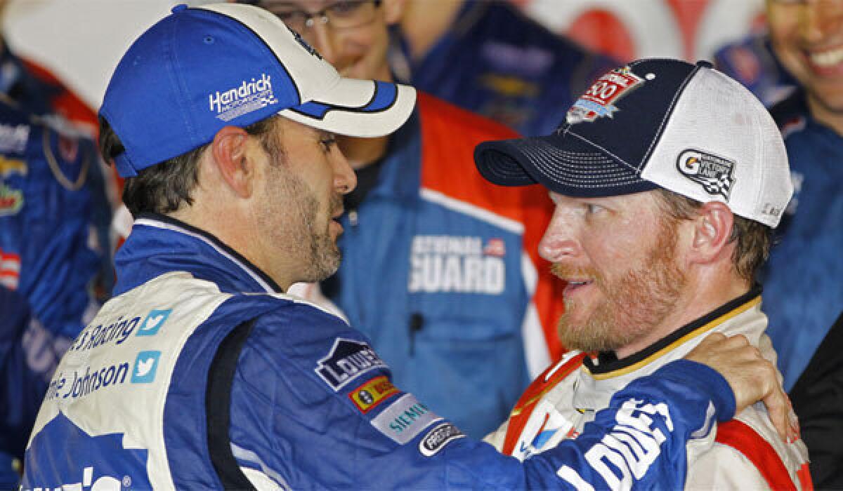 City National Bank will be looking to do business with Indy and National Hot Rod Assn. racers as well as businesses supporting NASCAR's stock-car racing operations. Above, Jimmie Johnson, left, congratulates Daytona 500 winner Dale Earnhardt Jr. in February.