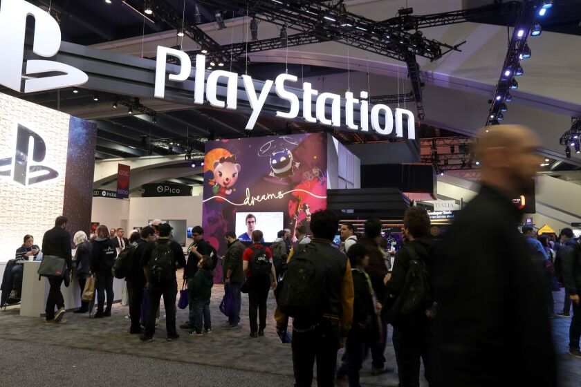 SAN FRANCISCO, CALIFORNIA - MARCH 20: Attendees walk by the Sony PlayStation booth at the 2019 GDC Game Developers Conference on March 20, 2019 in San Francisco, California. The GDC runs through March 22. (Photo by Justin Sullivan/Getty Images) ** OUTS - ELSENT, FPG, CM - OUTS * NM, PH, VA if sourced by CT, LA or MoD **