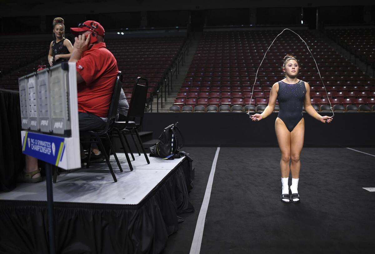 UCLA gymnast Macy Toronjo jumps rope while warming up before the PAC-12 Championships in Salt Lake City.