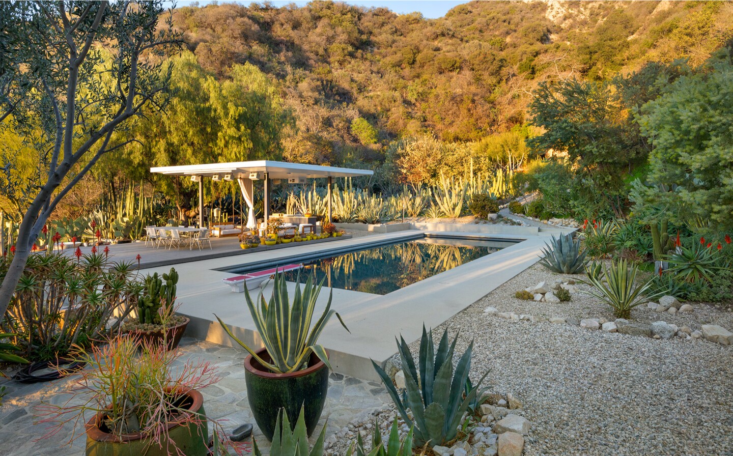 The hillside compound includes a 1950s gem designed by Richard Neutra, guesthouse and cabin surrounded by lawns and succulent gardens.