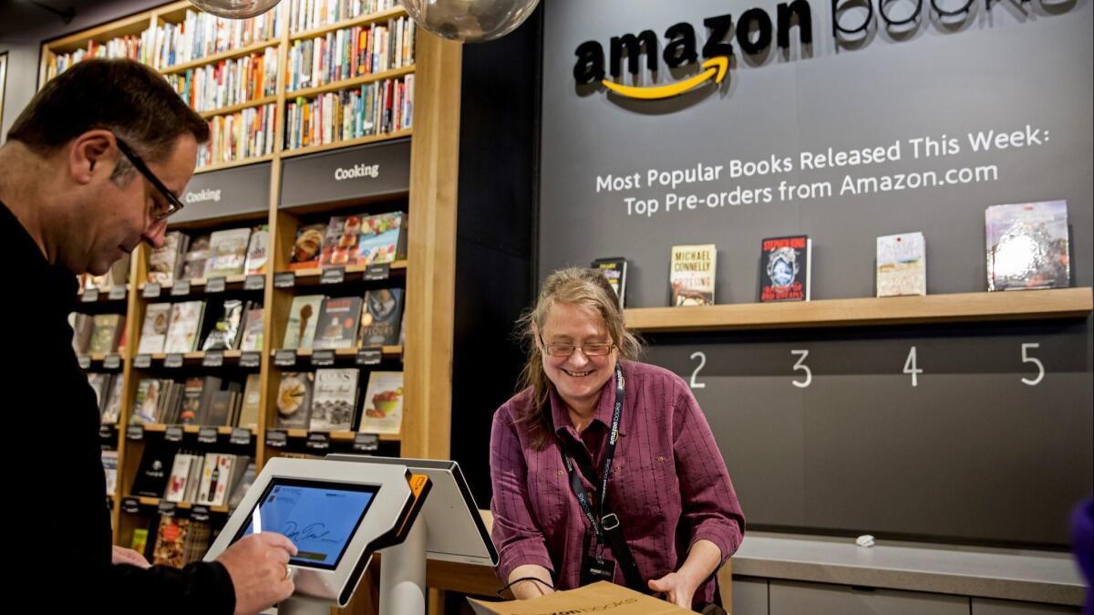 Shopping at Amazon Books in Seattle.