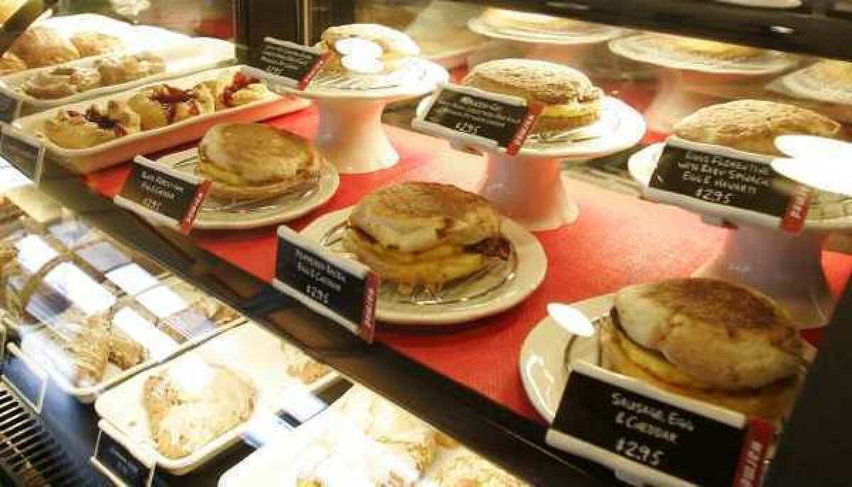 Starbucks breakfast sandwiches at a store in Seattle. The cafe giant will spend $100 million to buy the La Boulange Bakery brand.