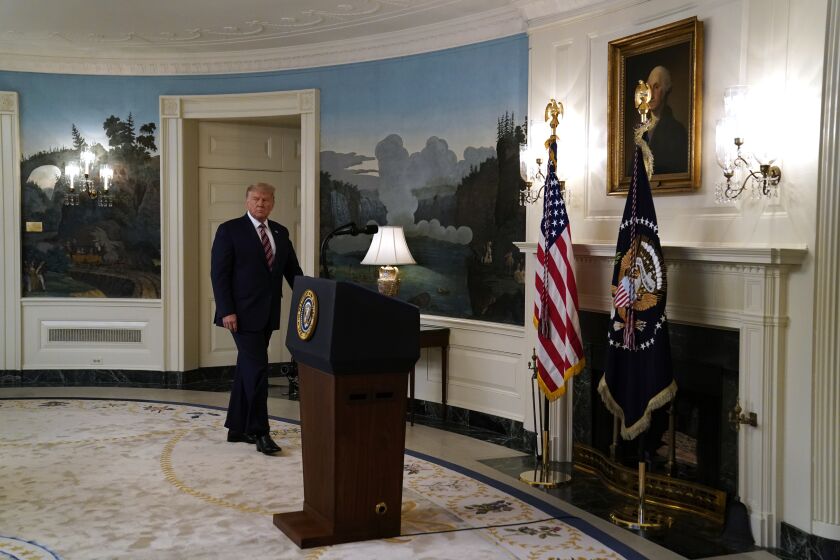President Donald Trump arrives for an event on judicial appointments, in the Diplomatic Reception Room of the White House, Wednesday, Sept. 9, 2020, in Washington. (AP Photo/Evan Vucci)