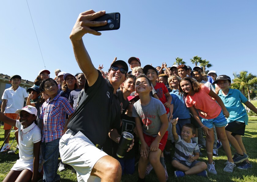 Phil Mickelson, shown Thursday during the Pro Kids |The First Tee of San Diego clinic Thursday at Colina Park Golf Course, has started revealing his humorous side on social media.