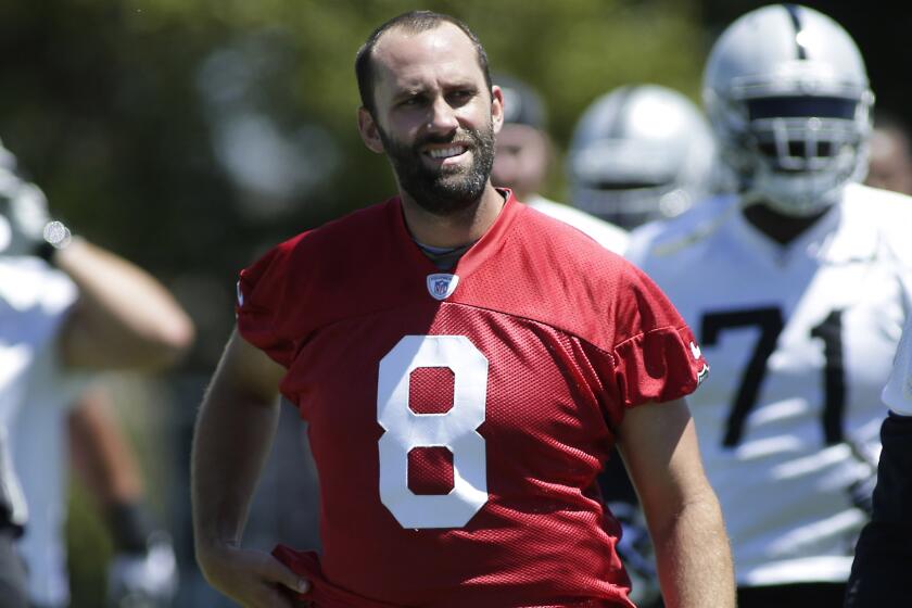Oakland Raiders quarterback Matt Schaub walks with his teammates during minicamp in June. Schaub is hoping to salvage his NFL career with the Raiders.