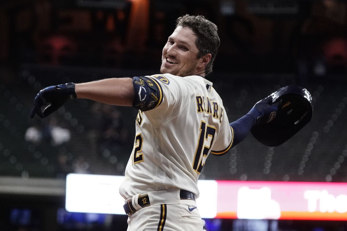 Milwaukee Brewers outfielder Hunter Renfroe reacts after hitting a walk-off single during the 10th inning.