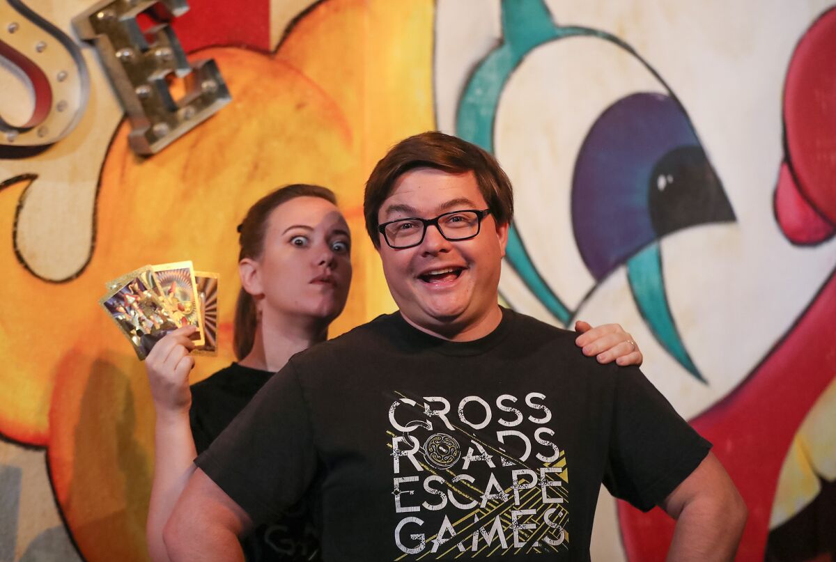 Owners Madison and Luke Rhoades at Cross Roads Escape Games in Anaheim.