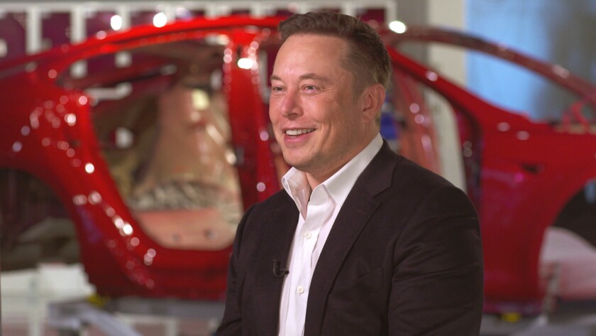 Elon Musk at Tesla's Fremont factory during a "60 Minutes" segment with CBS correspondent Lesley Stahl.