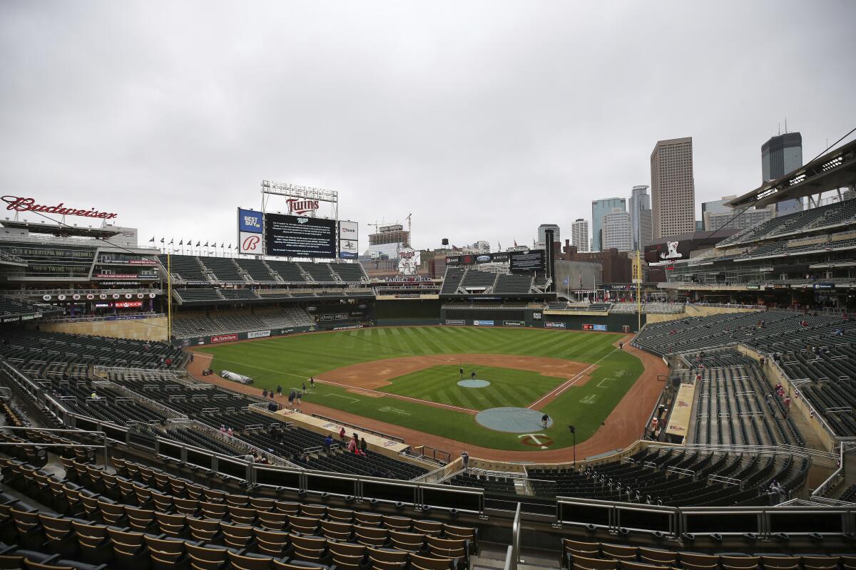 The scoreboard at Target Field explains the postponement of the baseball game between the Minnesota Twins and Boston Red Sox 