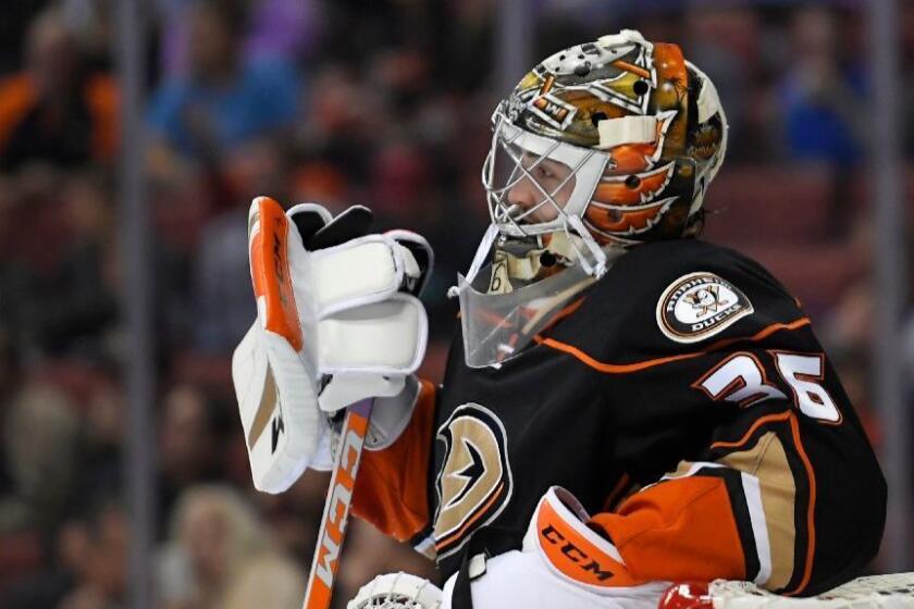 Ducks goalie John Gibson stands at his net after giving up four goals during the first period of a game against the Blue Jackets on Oct. 28.