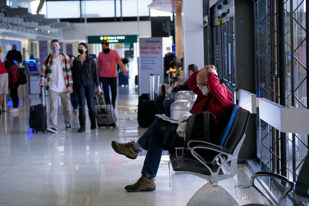 Travelers at San Diego International Airport.