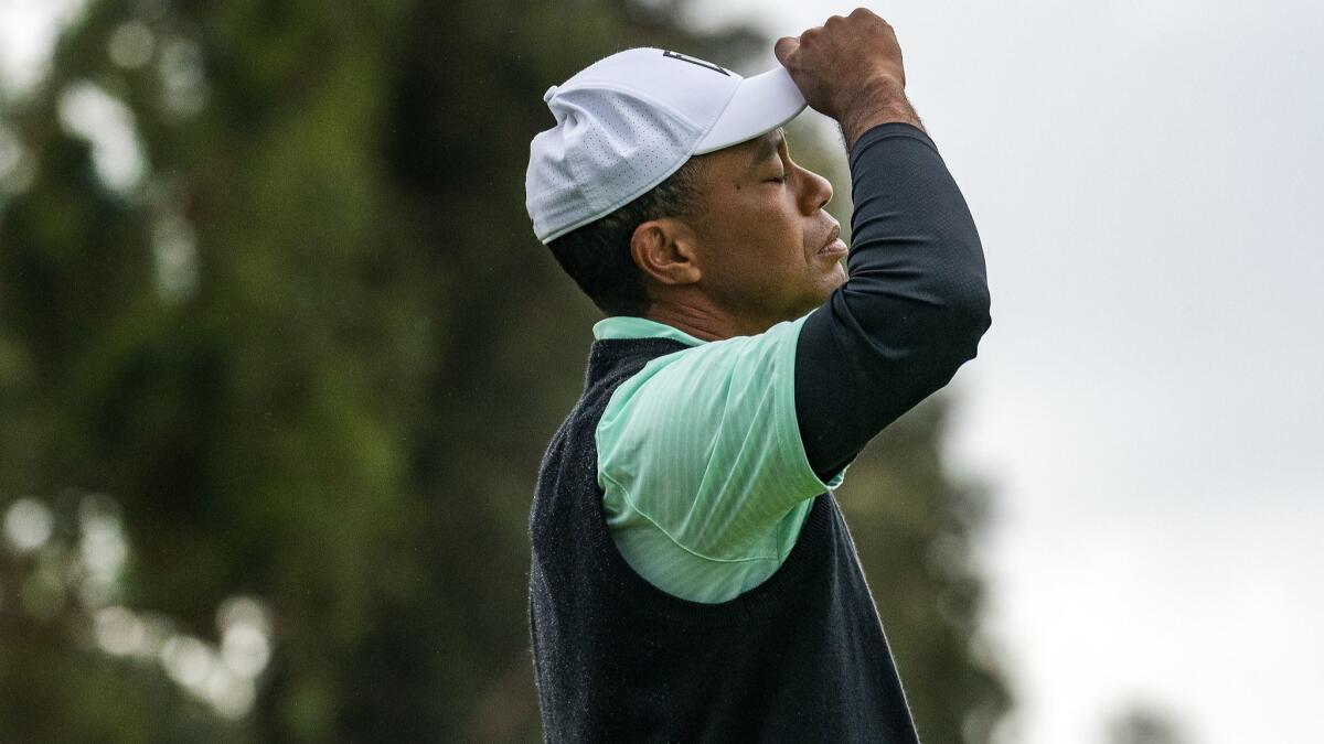 Tiger Woods reacts after missing a birdie putt on the 17th green during the Genesis Open at Riviera Country Club on February 15, 2019.