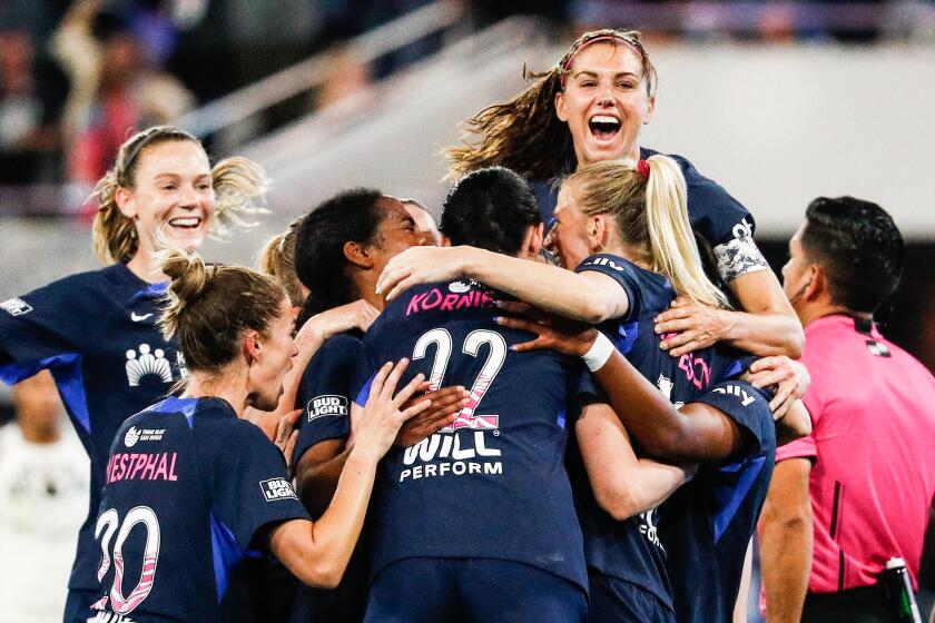 San Diego, CA - May 26: San Diego Wave FC forward Alex Morgan (13), right, and teammates celebrate Sofia Jakobsson's (10) goal against the Portland Thorns FC during their match at Snapdragon Stadium on Friday, May 26, 2023 in San Diego, CA. (Meg McLaughlin / The San Diego Union-Tribune)