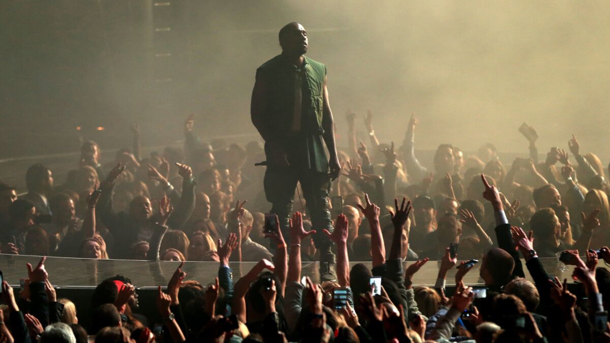Kanye West performs at the DirecTV Super Bowl party in Glendale, Ariz., on Jan. 31.