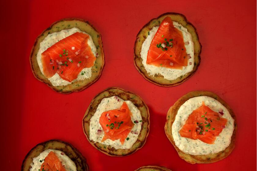 Smoked salmon with dill cream and lemon herb blini.