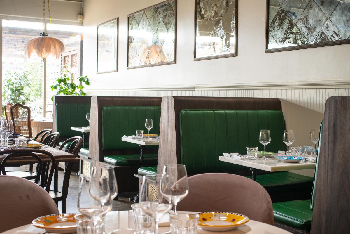 Cesarina's green leather booths
