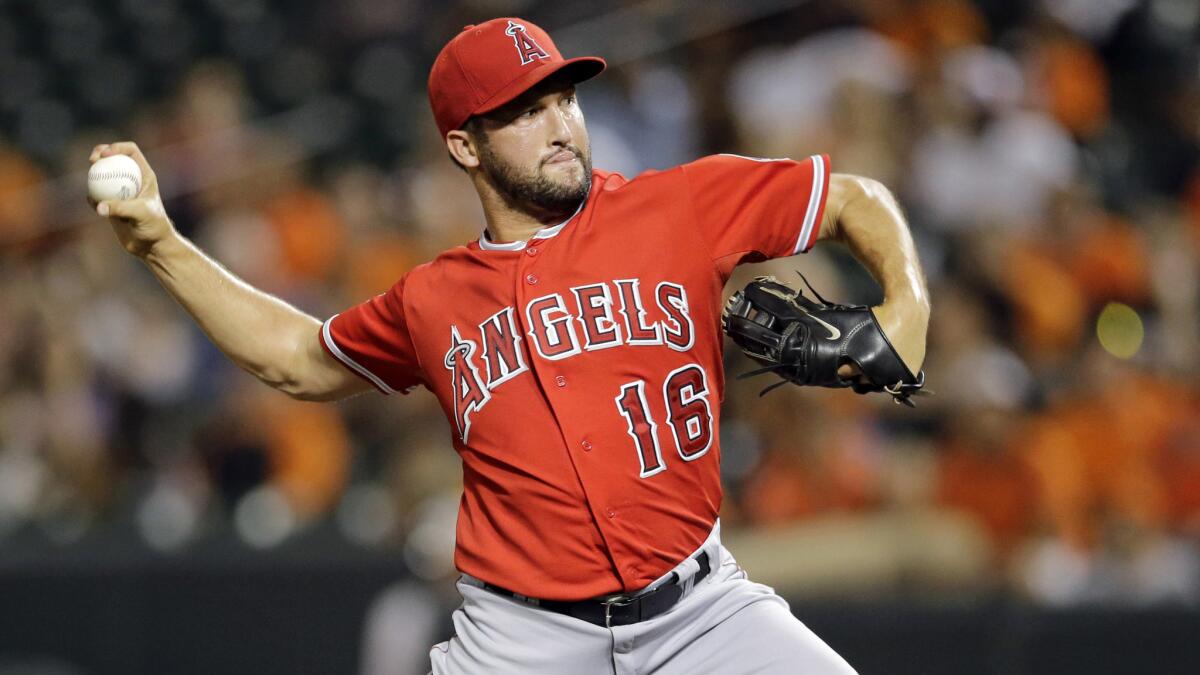 Angels closer Huston Street delivers a pitch during a win over the Baltimore Orioles on Thursday. Street has given the Angels an extra dose of confidence as they continue on their second-half push to win the AL West division title.