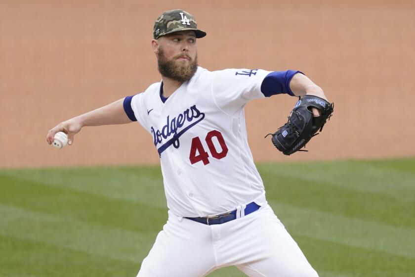 Los Angeles Dodgers starting pitcher Jimmy Nelson (40) throws during the first inning.