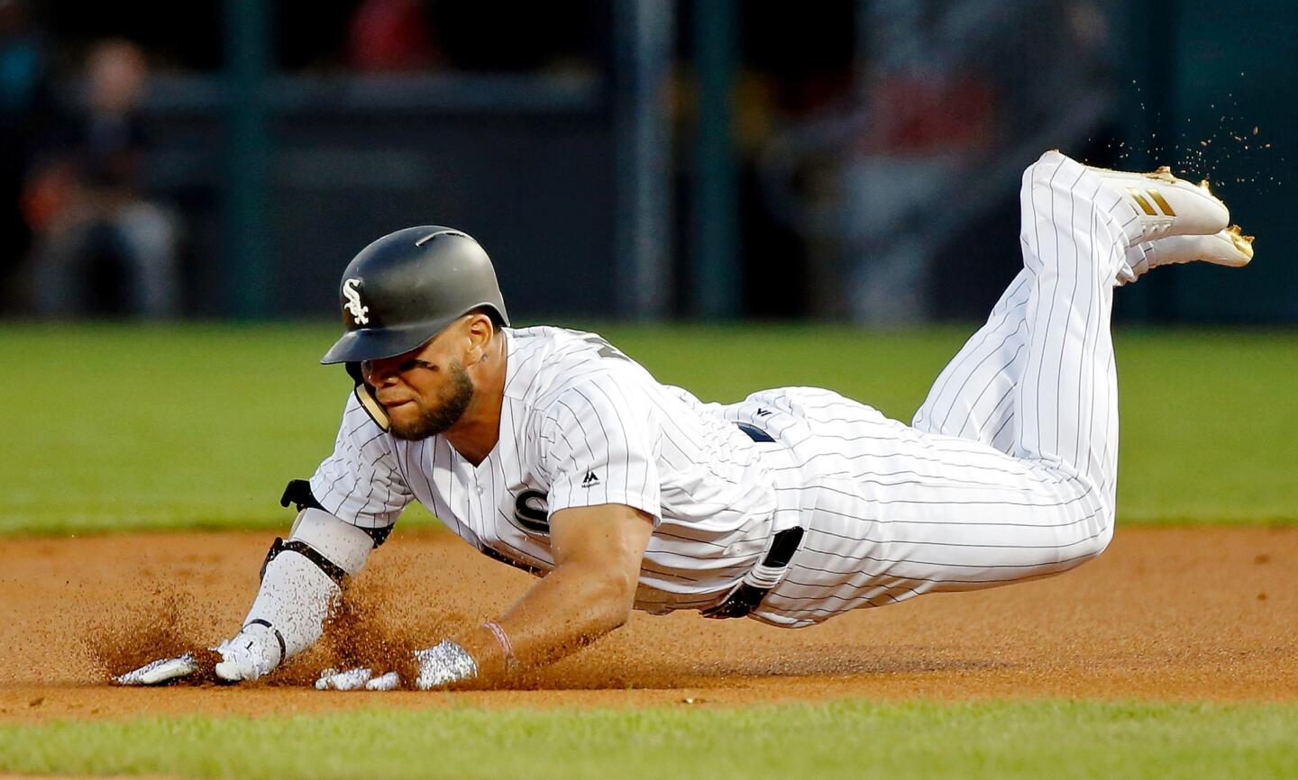 Yoan Moncada slides into second base for a double against the Twins during the first inning at Guaranteed Rate Field on Aug. 22, 2017.