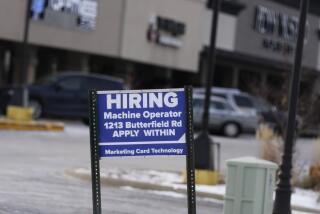 File - A hiring sign is seen in Downers Grove, Ill., Thursday, May 5, 2022. On Tuesday, the Labor Department reports on job openings and labor turnover for February.(AP Photo/Nam Y. Huh, File)