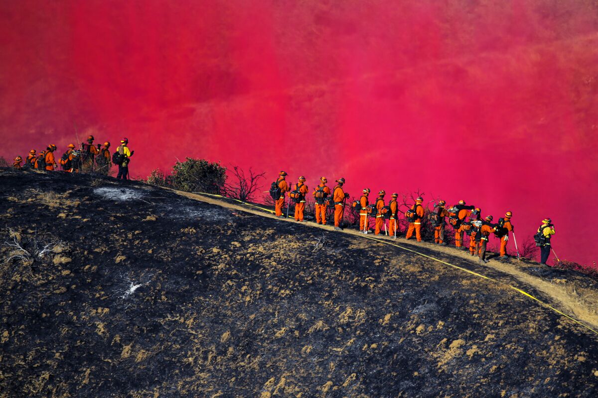 Firefighters on a ridgeline