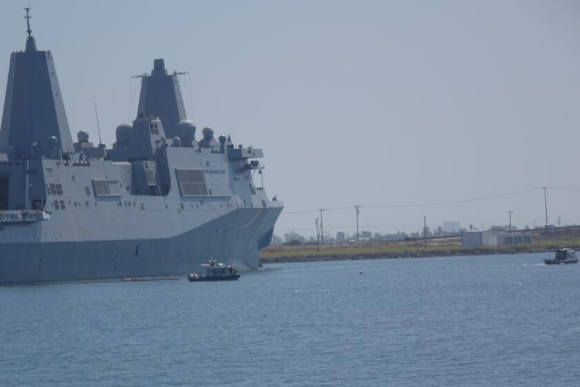 The USS New Orleans docked at Naval Weapons Station Seal Beach on Aug. 29. Seal Beach’s primary missions are to store ordnance for the Navy and Marine Corps, load and unload ammunition and maintain weapons on warships departing San Diego.