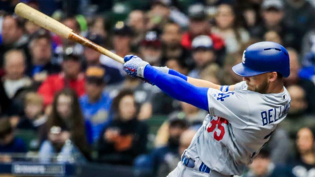The Dodgers' Cody Bellinger hits a home run in the sixth inning against the Milwaukee Brewers at Miller Park.
