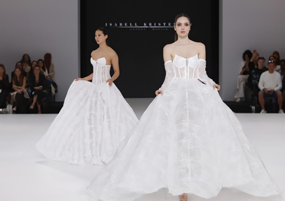 Models walk the runway at the Isabella Kristensen show at Barcelona Bridal Fashion Week.
