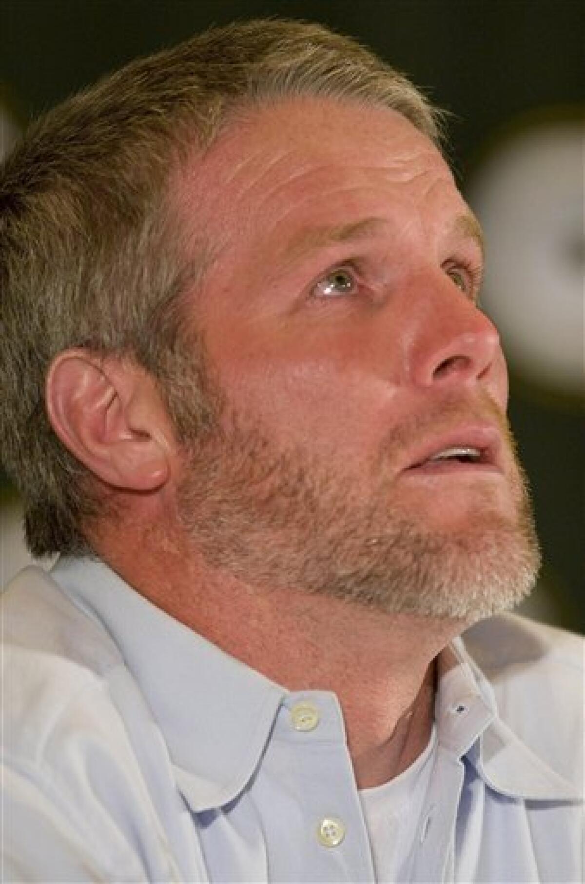 AP source: Favre tells Vikings he will not return
