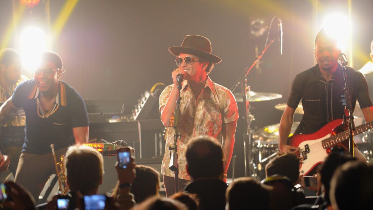 Bruno Mars performs at the IHeartRadio Theater in 2012 in New York City. IHeart, the biggest U.S. radio-station owner, has filed for bankruptcy.