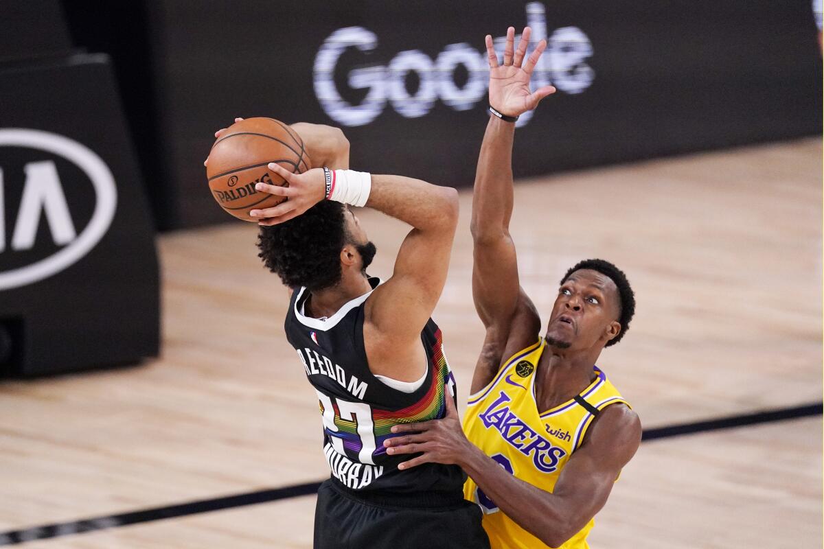 Nuggets guard Jamal Murray looks to score against Lakers guard Rajon Rondo during Game 4.