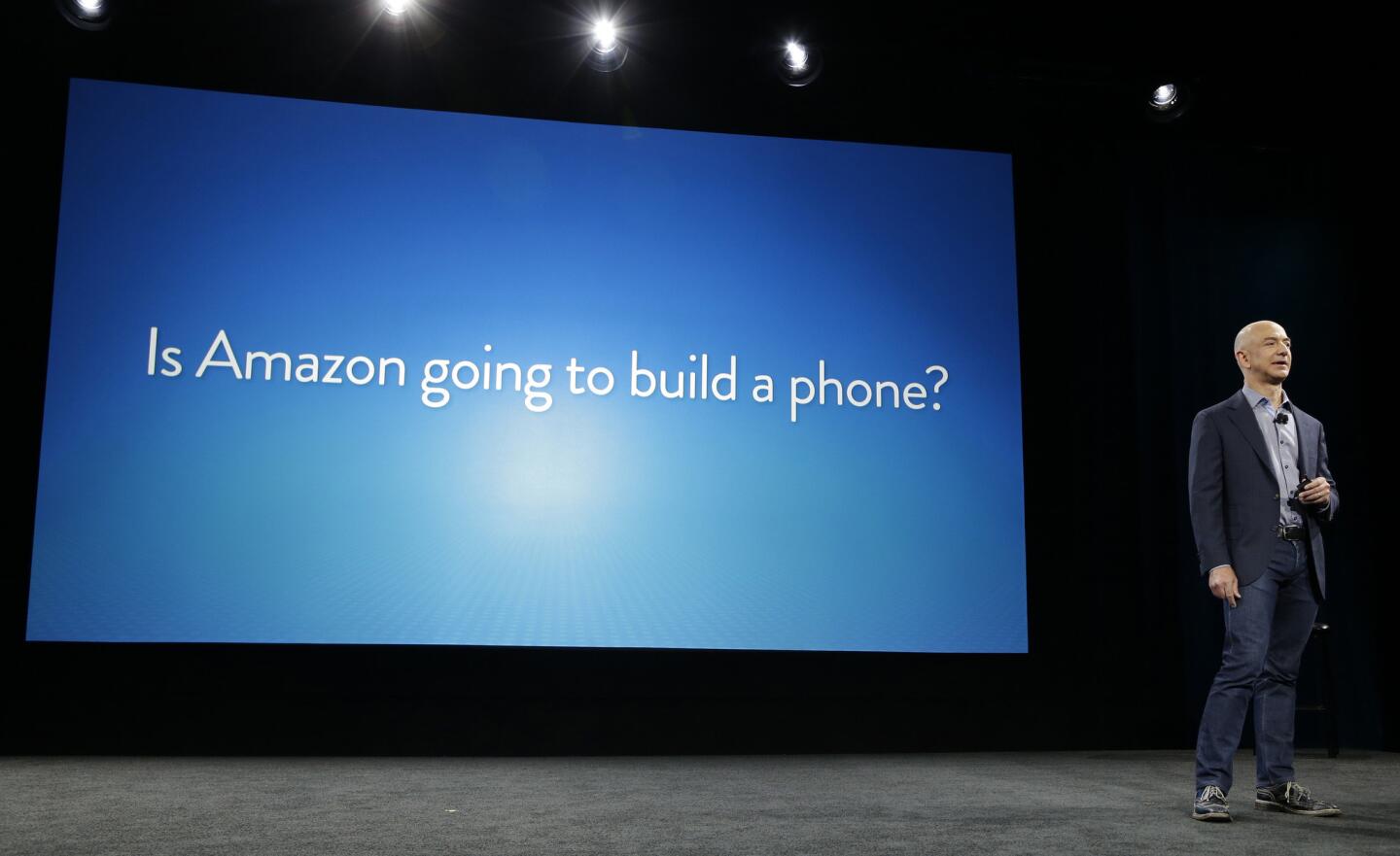 Amazon CEO Jeff Bezos stands on stage just before unveiling the Amazon Fire Phone in Seattle.