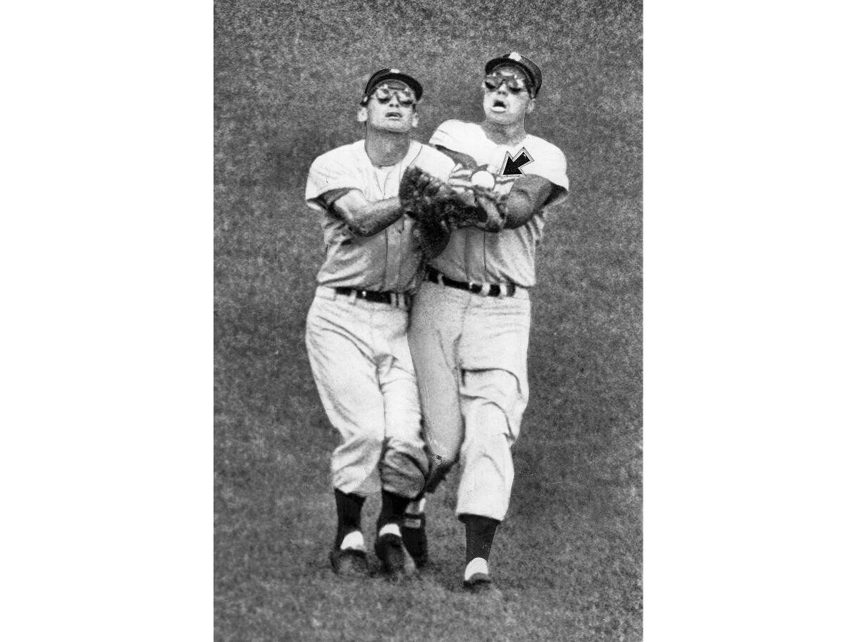 Oct. 1, 1959: Ball pops out of glove of Dodger center fielder Duke Snider, right, as he and left fielder Wally Moon collide in the third inning of opening game in 1959 World Series. They were trying to catch White Sox’s Sherm Lollar fly ball. The White Sox won the first game 11-0. 