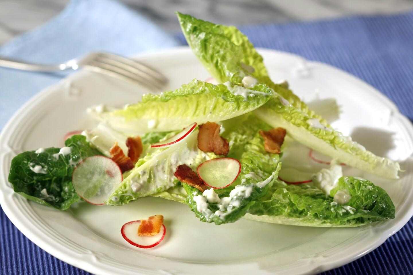 A perfect way to kick off the meal. Recipe: Romaine salad with blue cheese, bacon and radishes